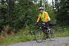 cyclist on wooded bike trail